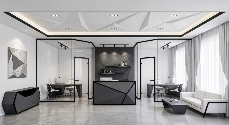 Office completed by the Almashhad Sky team: Grey office with angled corners and glass partitions
